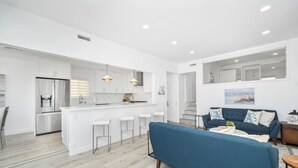 Living area - BRAND NEW LOWER UNIT ON BEACH W/ PATIO & FIREPIT (Newport Beach)