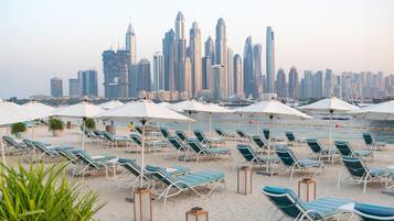 Private beach, white sand, beach cabanas, sun-loungers