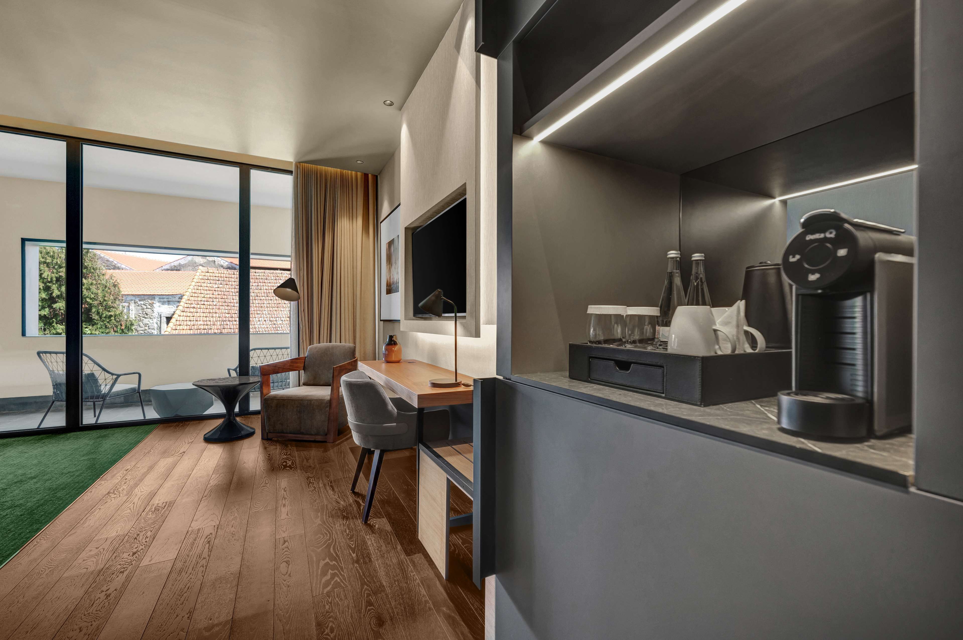 deluxe double room, balcony | living area | 55-inch smart tv with cable channels, tv