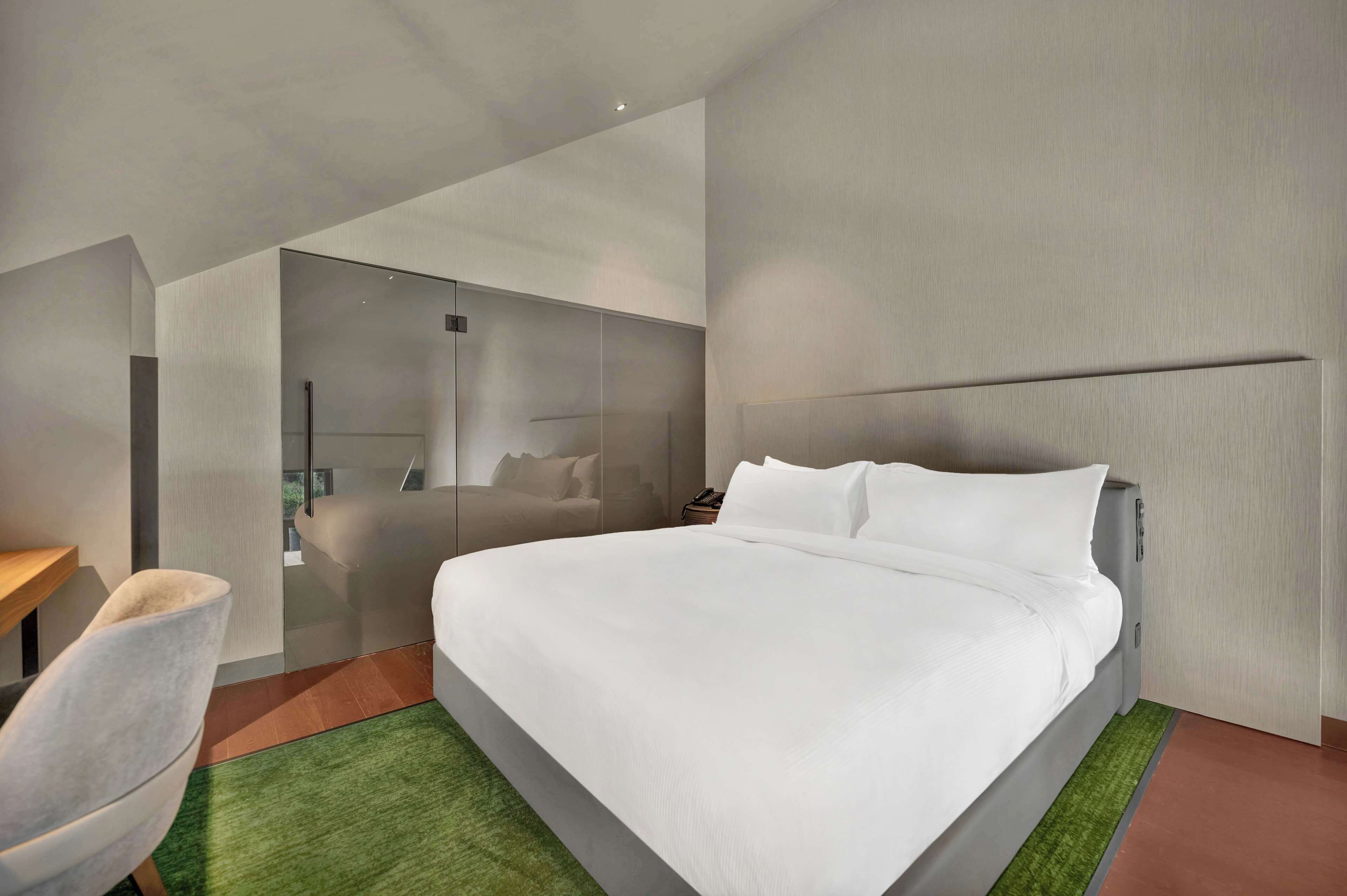 Family Room, 1 King Bed with Sofa bed | Premium bedding, memory foam beds, minibar, in-room safe