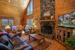 Televisio, takka, DVD-soitin, pöytÀjalkapallopöytÀ