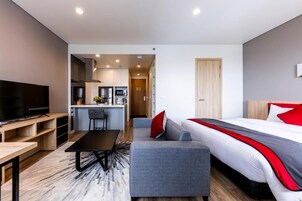 Basic Studio | In-room safe, desk, laptop workspace, blackout drapes