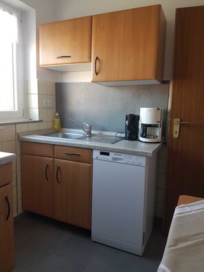Fridge, oven, dishwasher, high chair