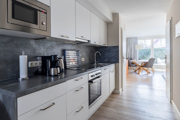 Fridge, microwave, dishwasher, coffee/tea maker