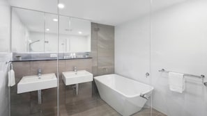 Bathtub, hair dryer, towels