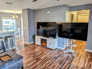 TV connectée, cheminée, lecteur de DVD, espaces bureaux