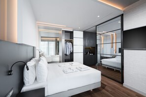 Exclusive-sviitti | Ylelliset vuodevaatteet, memory foam -patjalliset sängyt, minibaari