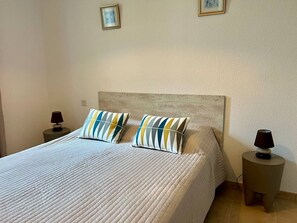 1 bedroom, iron/ironing board, travel crib, bed sheets