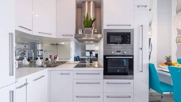 Apartment | Private kitchen | Fridge, microwave, oven, stovetop