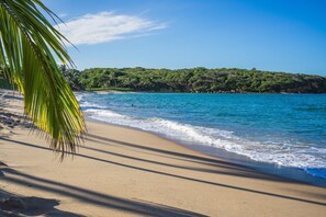 On the beach, sun loungers, beach towels