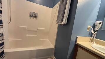 Combined shower/bathtub, hair dryer