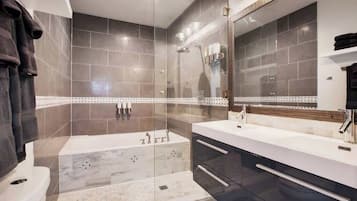 Shower, hair dryer, towels, shampoo