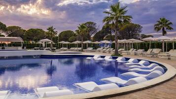 Indoor pool, seasonal outdoor pool, pool umbrellas, pool loungers