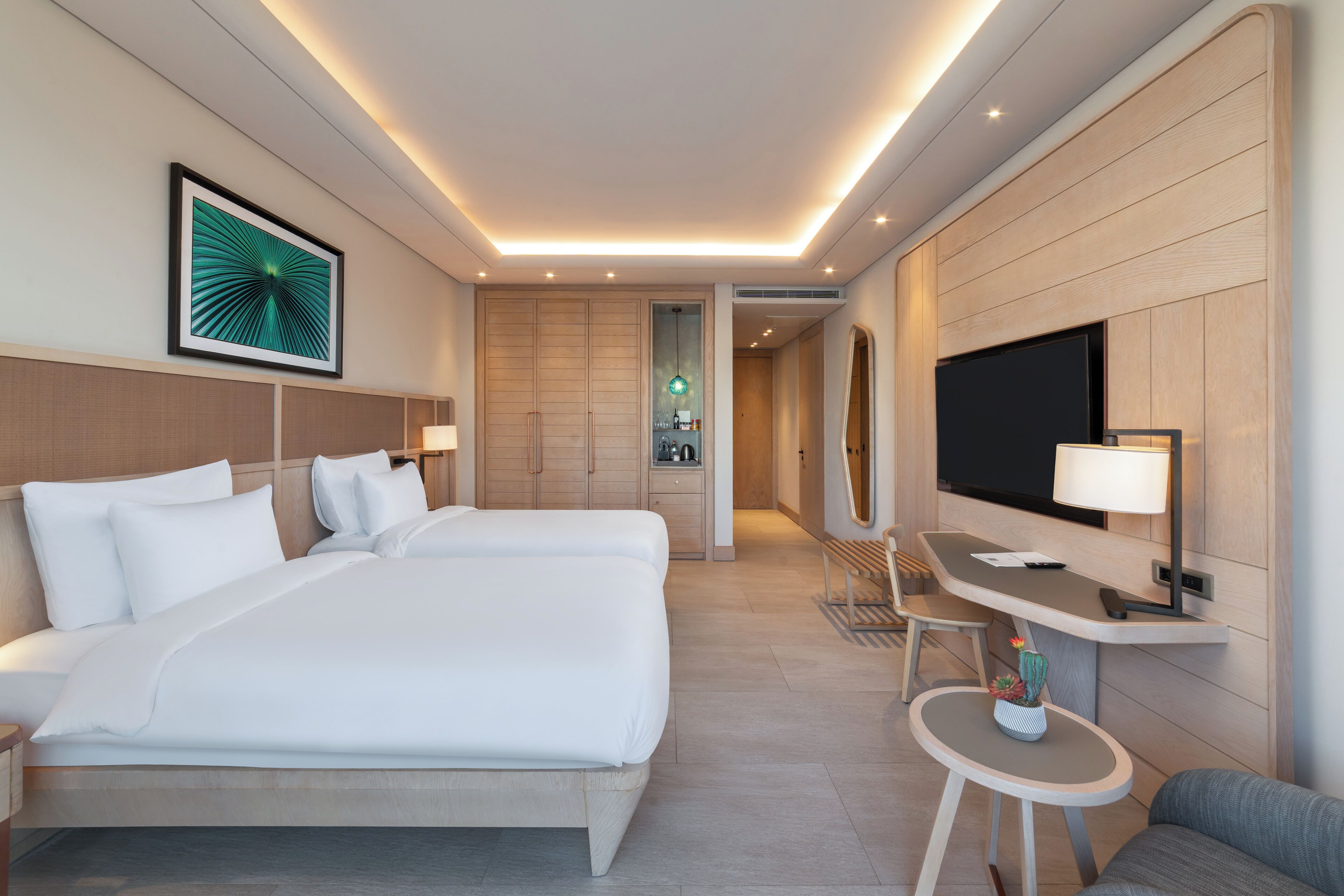 Premium bedding, down comforters, minibar, in-room safe