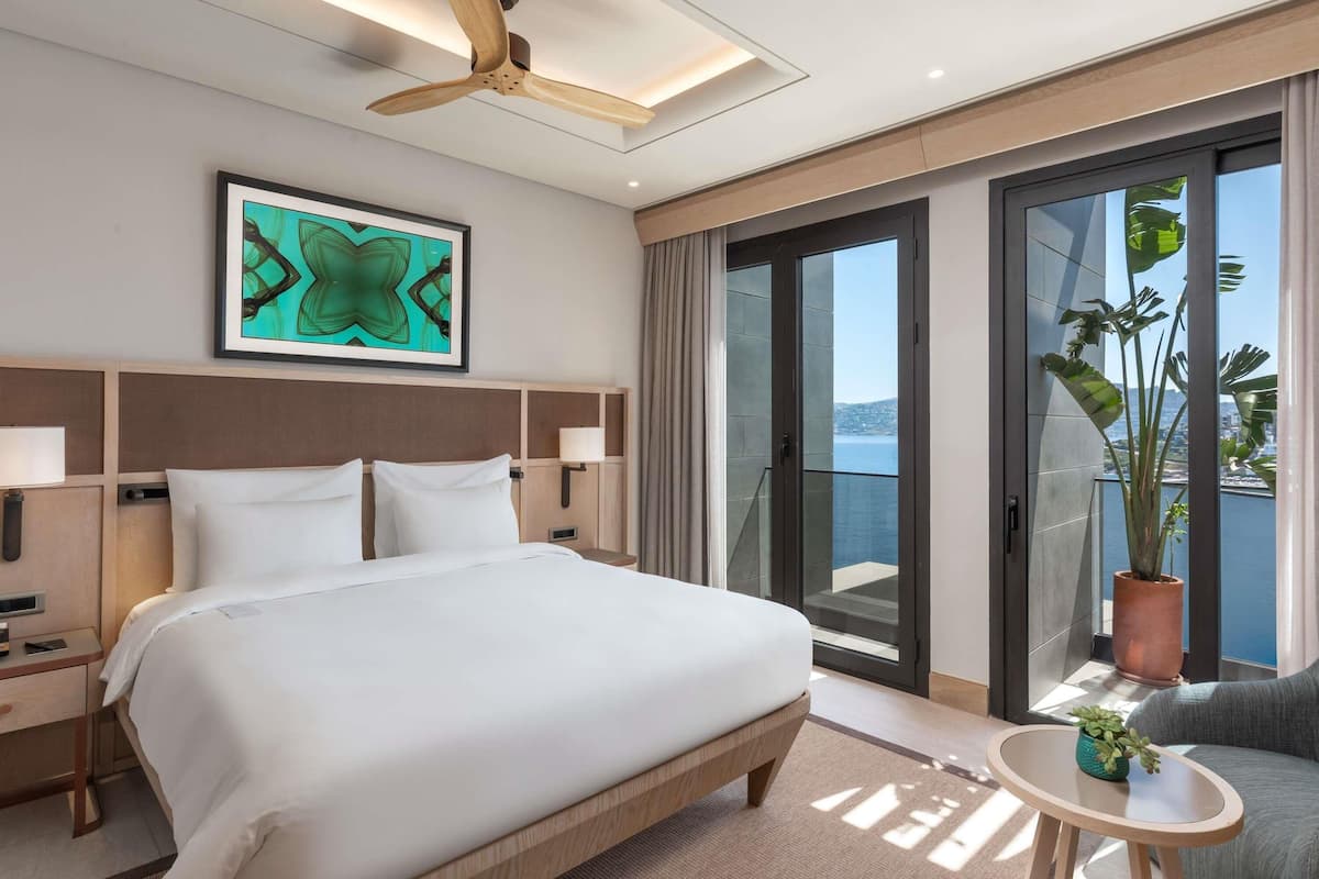 Premium bedding, down comforters, minibar, in-room safe