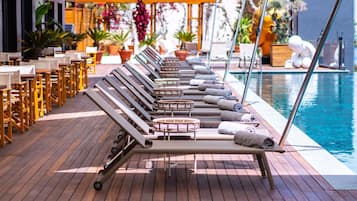 Indoor pool, seasonal outdoor pool, pool umbrellas, pool loungers