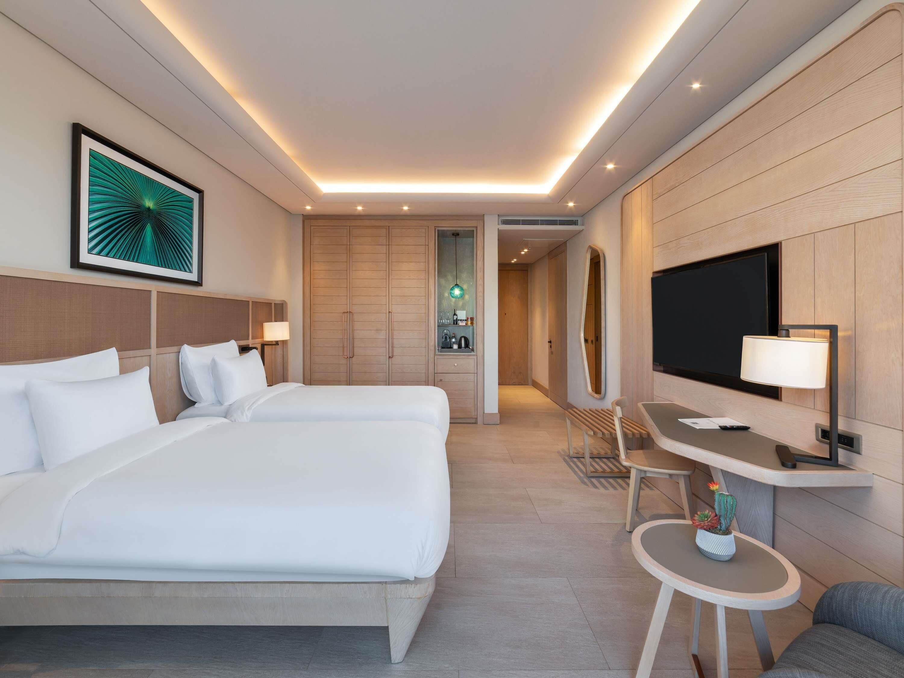 Premium bedding, down duvets, minibar, in-room safe