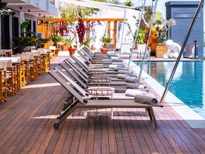 Indoor pool, seasonal outdoor pool, pool umbrellas, pool loungers