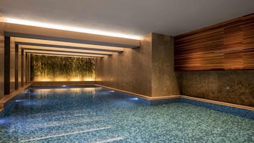 Indoor pool, seasonal outdoor pool, pool umbrellas, pool loungers