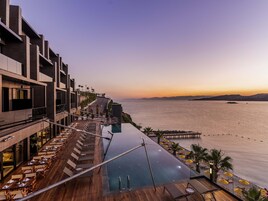 Indoor pool, seasonal outdoor pool, pool umbrellas, sun loungers