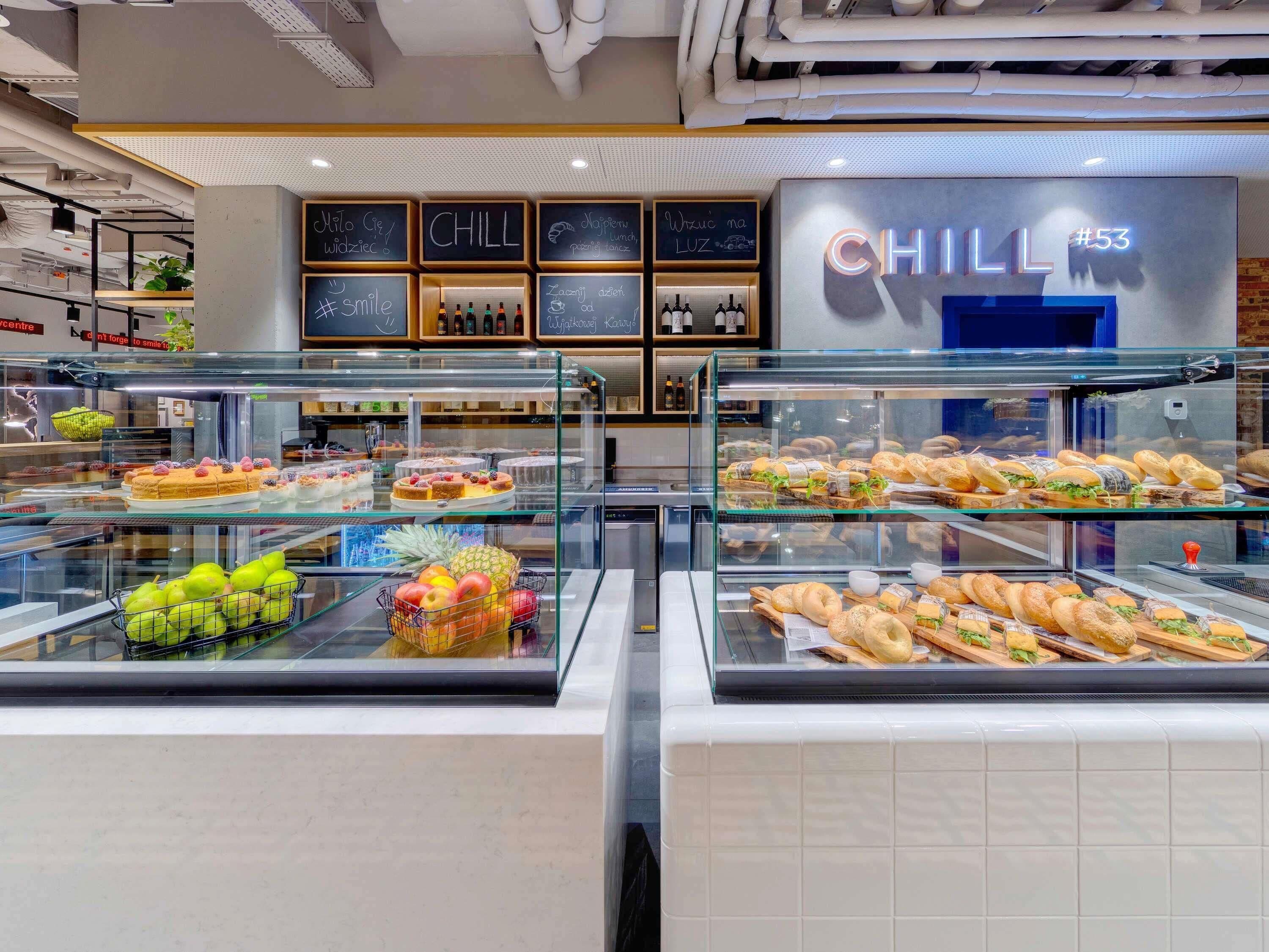 A bakery display with various baked goods and a sign reading 'CHILL #53'.