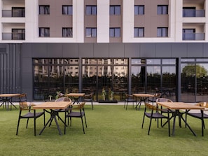 A modern building with multiple balconies and large windows. - Mövenpick Hotel Trabzon (Trabzon)