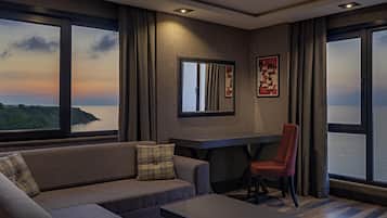 Deluxe Room, 1 Double Bed, Sea View | Minibar, in-room safe, desk, soundproofing