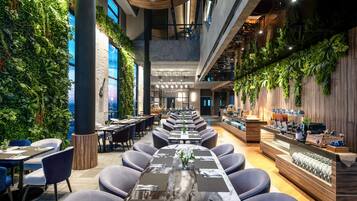 Breakfast, lunch, dinner served; international cuisine