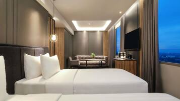 Junior Suite, 2 Single Beds | Premium bedding, minibar, desk, laptop workspace