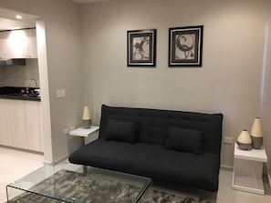 Standard Apartment | Living room | 32-inch TV with cable channels