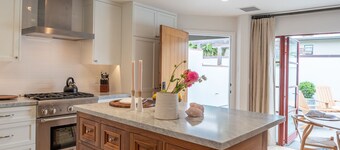 Carmel-By-The-Sea~~   Corner of Mission & 7th. ~~    2 Bedroom Luxury Apartment