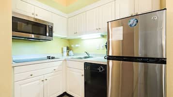Microwave, stovetop, dishwasher, dining tables
