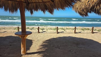On the beach, sun-loungers, beach towels