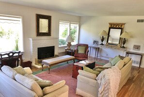 TV, fireplace, books, offices