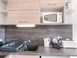 Fridge, microwave, toaster, high chair