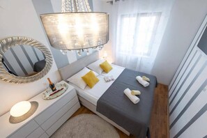 2 habitaciones, tabla de planchar con plancha, wifi y ropa de cama 
