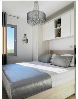 2 habitaciones, tabla de planchar con plancha, wifi y ropa de cama 