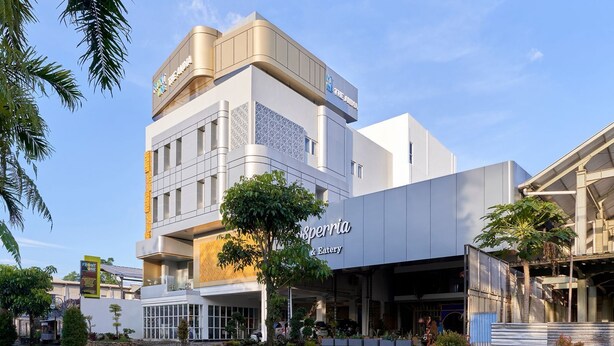A modern building with a restaurant named 'Spennia & Eatery' on the ground floor. - Front One The Andia Boyolali (Boyolali)