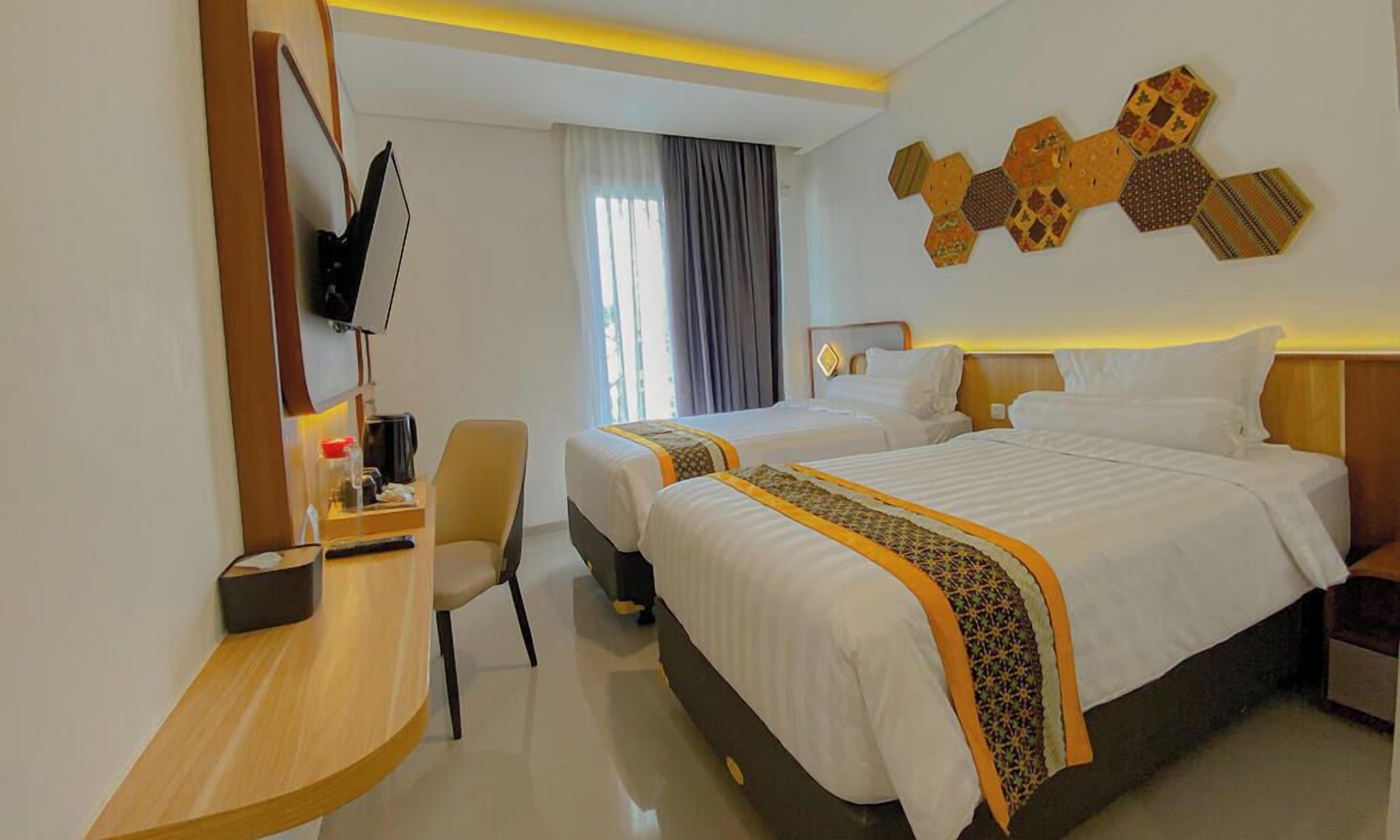 行政客房 | 高档床上用品、办公桌、笔记本电脑工作区、免费 WiFi