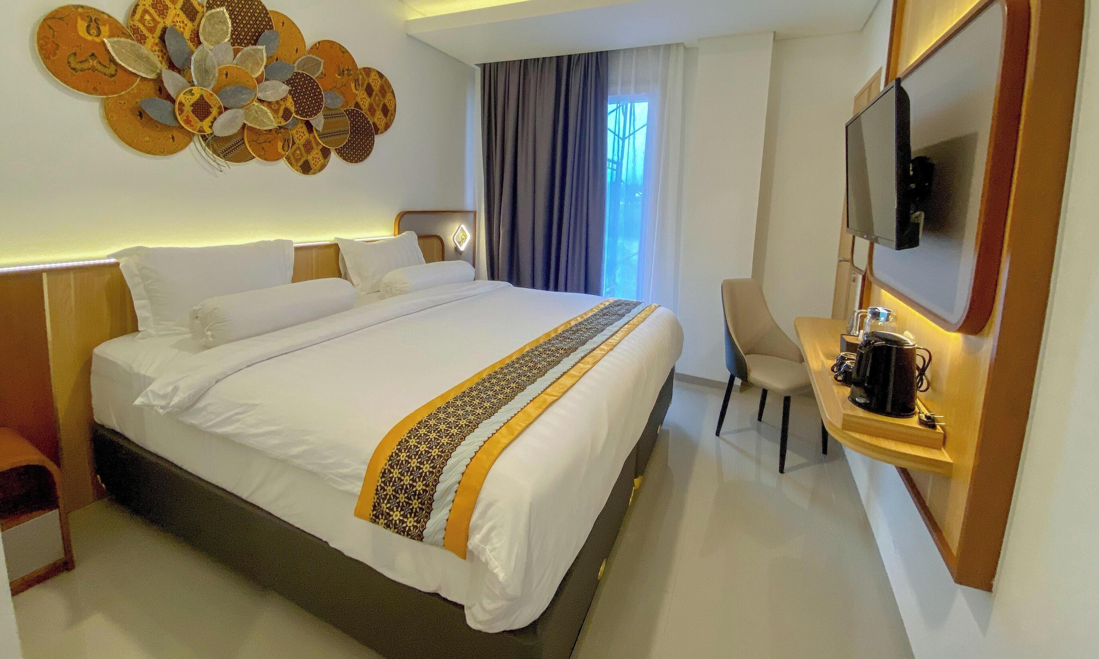 Habitación ejecutiva | Ropa de cama de alta calidad y escritorio