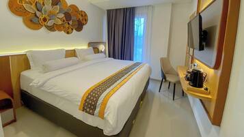 Habitación ejecutiva | Ropa de cama de alta calidad y escritorio