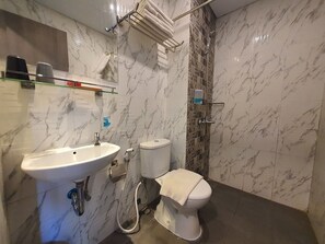 Shower, free toiletries, towels, soap