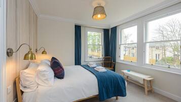 4 bedrooms, premium bedding, iron/ironing board, free WiFi