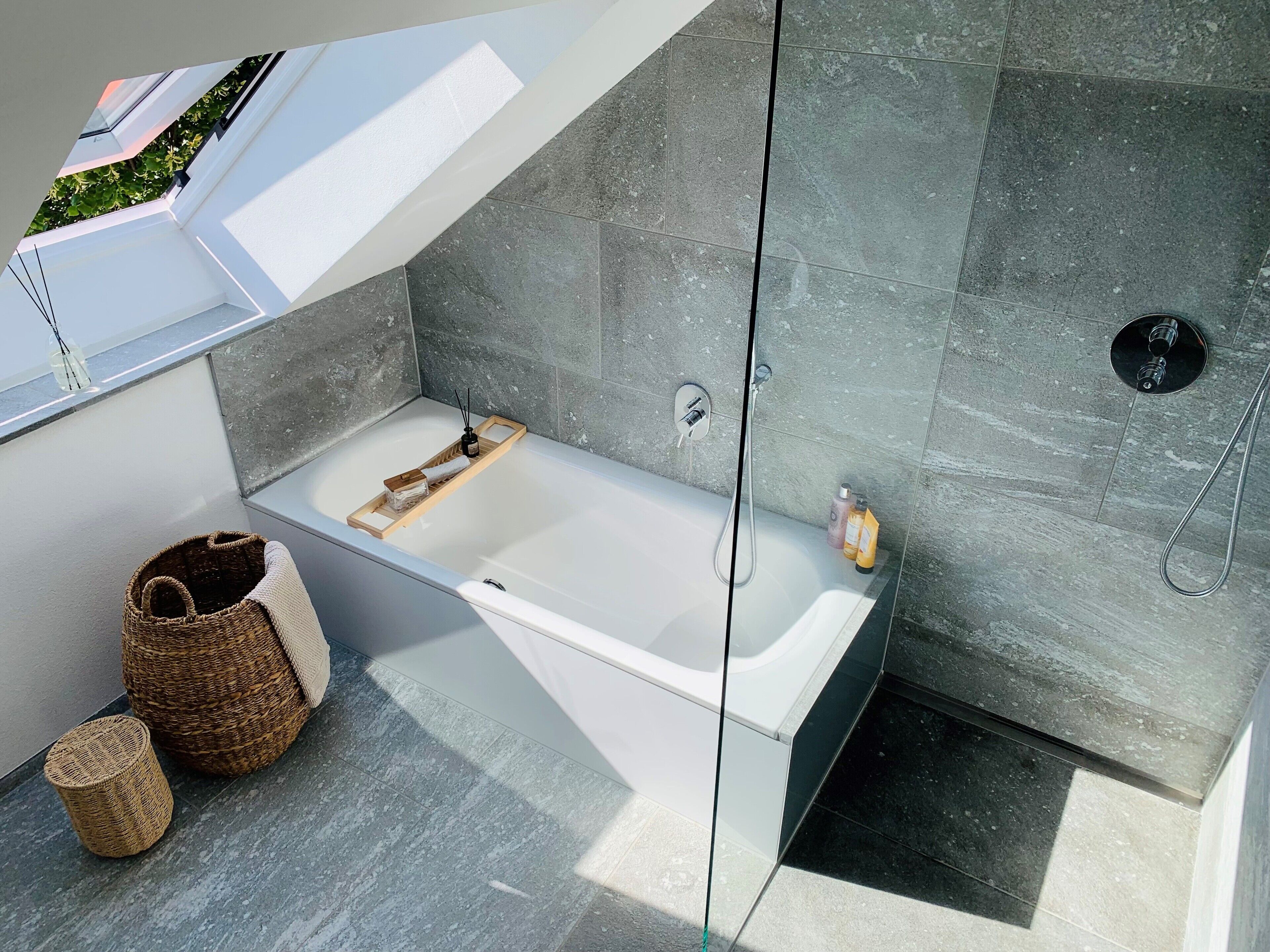 Bathtub, hair dryer, towels, soap