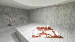 A modern bathroom with a marble floor, a large mirror, and a towel rack. - Ring Downtown Hotel (Antalya)