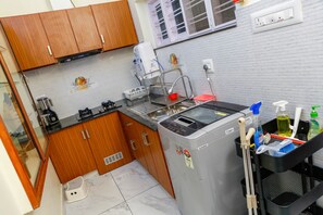 Fridge, microwave, oven, stovetop - Posh 7 BHK at BELLJEM Homes inside colony close to city (Thrissur)