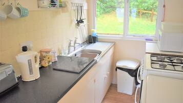 Fridge, microwave, high chair