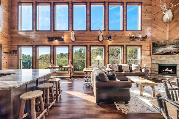 Family Room on the main level with large TV with live TV and streaming services