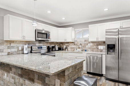 Fridge, microwave, oven, stovetop. CYC Eclectic Back House with BBQ Gazebo