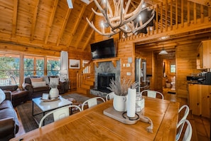 Smart TV, fireplace, foosball, books